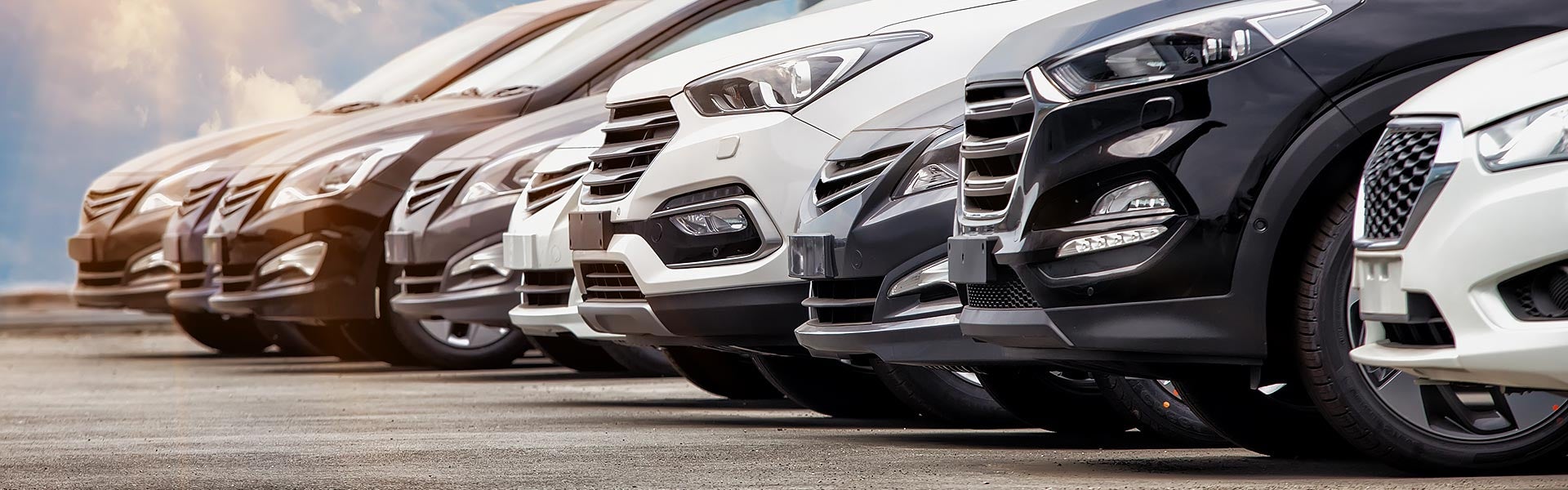 Man examining a used vehicle at Jennings Buick GMC